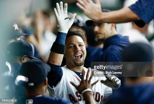 Yuli Gurriel of the Houston Astros celebrates in the dugiut after hitting a three-run home run in the third inning against the Chicago White Sox at...