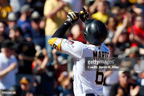 Starling Marte of the Pittsburgh Pirates reacts after hitting a home run in the third inning against the Philadelphia Phillies at PNC Park on July 7,...