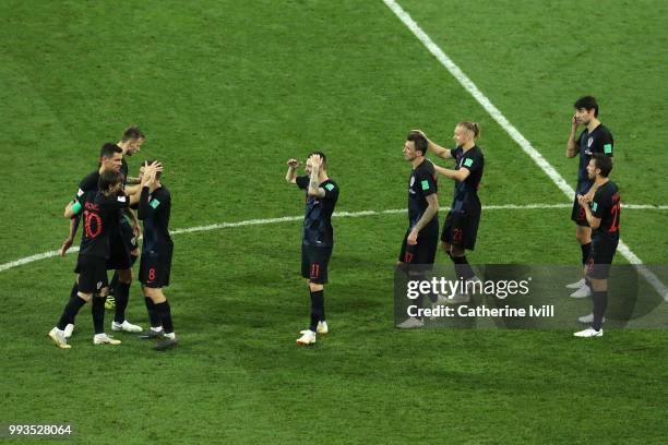 Croatia players celebrate following their sides victory in the 2018 FIFA World Cup Russia Quarter Final match between Russia and Croatia at Fisht...