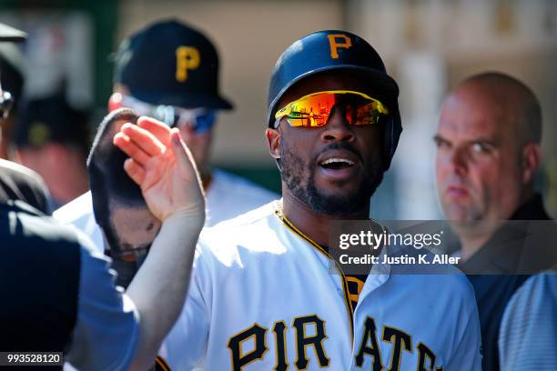 Starling Marte of the Pittsburgh Pirates celebrates after scoring on a RBI single in the first inning against the Philadelphia Phillies at PNC Park...