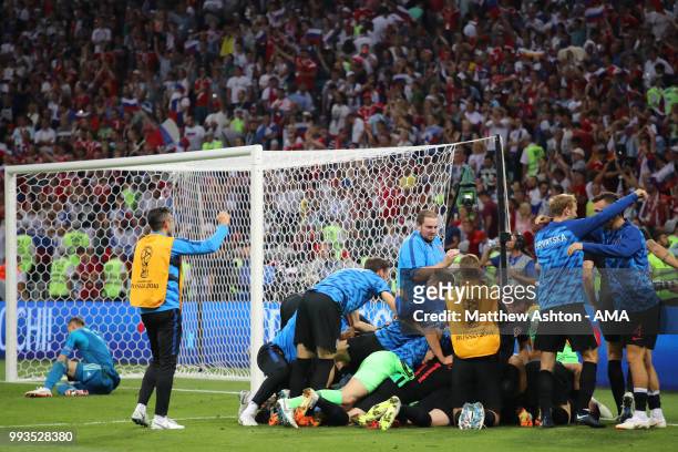 The Croatia players celebrate after their victory in a penalty shootout during the 2018 FIFA World Cup Russia Quarter Final match between Russia and...