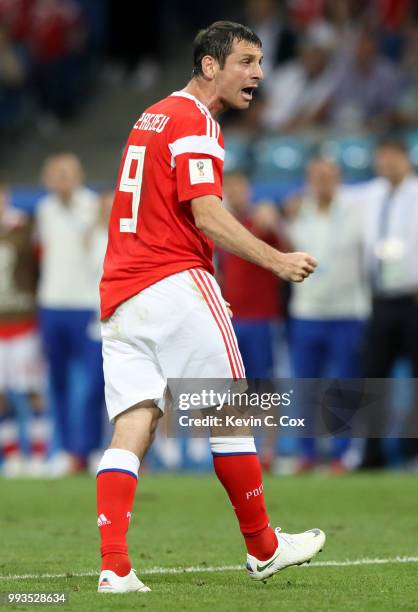 Alan Dzagoev of Russia celebrates scoring his team's second penalty in the penalty shoot out during the 2018 FIFA World Cup Russia Quarter Final...