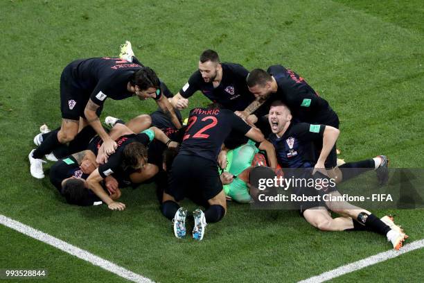 Croatia players celebrate winning the penalty shoot out during the 2018 FIFA World Cup Russia Quarter Final match between Russia and Croatia at Fisht...