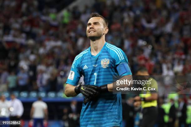 Igor Akinfeev of Russia celebrates after he saves the second penalty from Mateo Kovacic of Croatia in the penalty shoot out the 2018 FIFA World Cup...