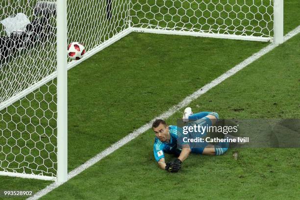 Igor Akinfeev of Russia fails to stop Luka Modric of Croatia's penalty in the penalty shoot out during the 2018 FIFA World Cup Russia Quarter Final...