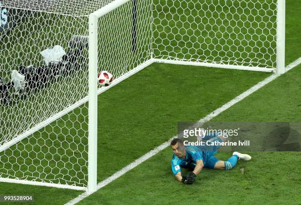 Igor Akinfeev of Russia fails to stop Luka Modric of Croatia's penalty in the penalty shoot out during the 2018 FIFA World Cup Russia Quarter Final...