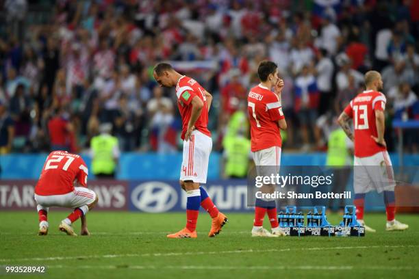 PLayers of Russia show their dejection following the defeat in the 2018 FIFA World Cup Russia Quarter Final match between Russia and Croatia at Fisht...