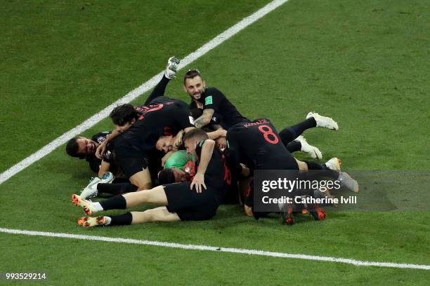 Croatia players celebrate winning the penalty shoot out during the 2018 FIFA World Cup Russia Quarter Final match between Russia and Croatia at Fisht...