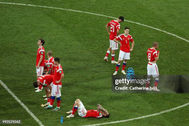 Players of Russia show their dejection following the defeat in the 2018 FIFA World Cup Russia Quarter Final match between Russia and Croatia at Fisht...