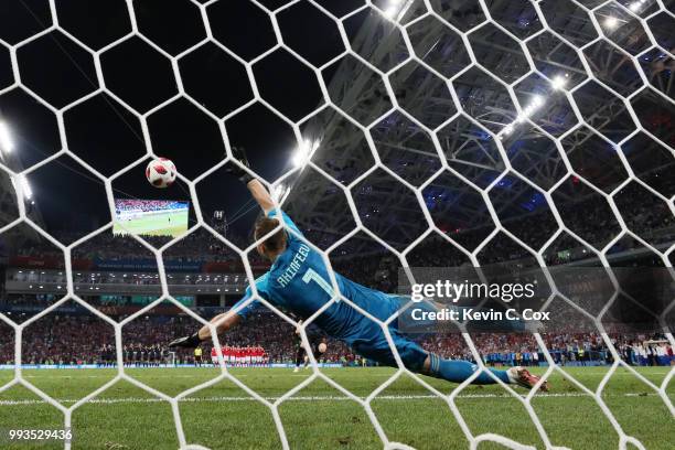 Marcelo Brozovic of Croatia scores his team's first penalty in the penalty shoot out past Igor Akinfeev of Russia during the 2018 FIFA World Cup...