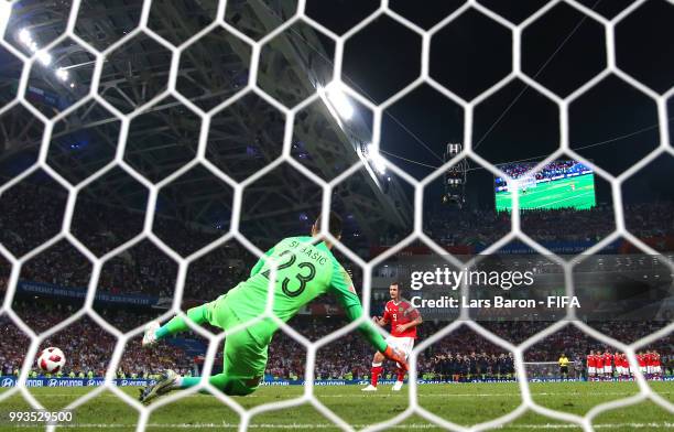Alan Dzagoev of Russia scores past Danijel Subasic of Croatia his team's second penalty in the penalty shoot out during the 2018 FIFA World Cup...