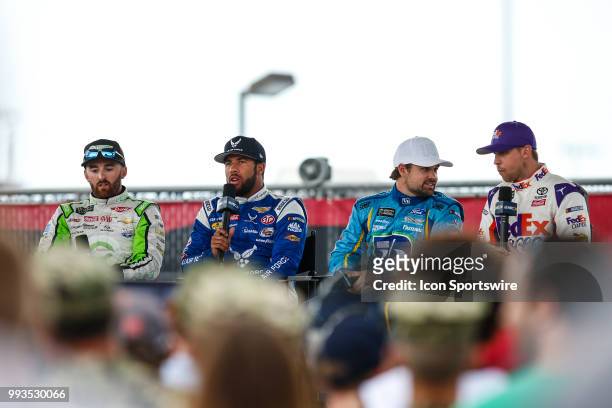Austin Dillon, driver of the American Ethanol e15 Chevrolet, Bubba Wallace, driver of the U.S. Air Force Chevrolet, Ricky Stenhouse Jr., driver of...