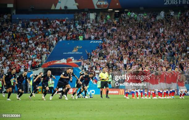 Players of Croatia celebrate after winning the penalty shootout of the 2018 FIFA World Cup Russia quarter final match between Russia and Croatia at...