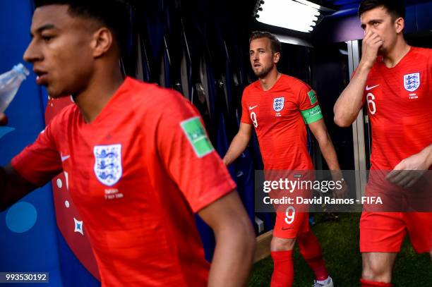 Jesse Lingard, Harry Kane and Harry Maguire of England walk out for the second half of the 2018 FIFA World Cup Russia Quarter Final match between...
