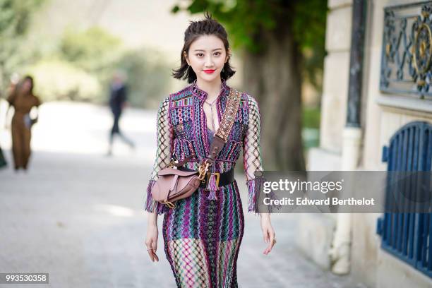 Tian Jing , outside Dior, during Paris Fashion Week Haute Couture Fall Winter 2018/2019, on July 2, 2018 in Paris, France.