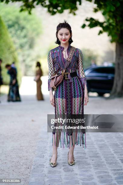 Tian Jing , outside Dior, during Paris Fashion Week Haute Couture Fall Winter 2018/2019, on July 2, 2018 in Paris, France.