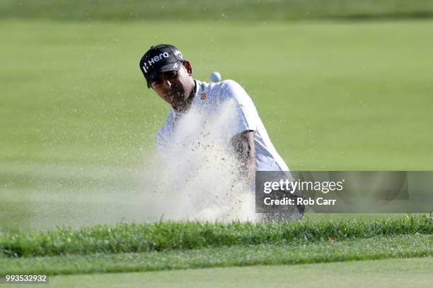 Anirban Lahiri of India hits from the bunker to the 17th green during round three of A Military Tribute At The Greenbrier held at the Old White TPC...