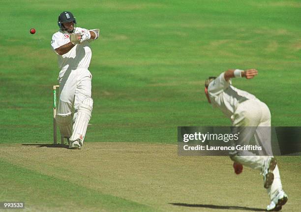 Nasser Hussain of England hits out at a ball from Brett Lee of Australia during the fifth day of the England v Australia fourth NPower test match at...