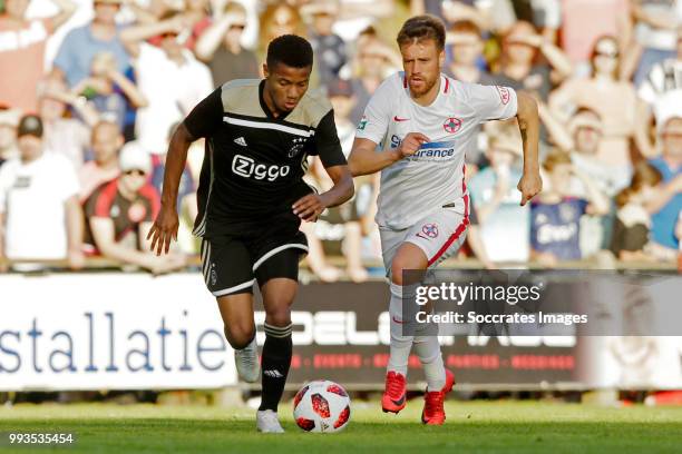 David Neres of Ajax, Mihai Pintilii of Steaua Bucharest during the Club Friendly match between Ajax v Steaua Bucharest at the Sportpark 't Achterveen...