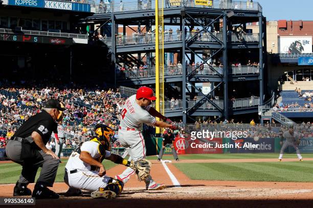 Scott Kingery of the Philadelphia Phillies hits a RBI single in the seventh inning against the Pittsburgh Pirates at PNC Park on July 7, 2018 in...