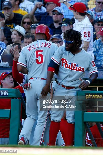Nick Williams of the Philadelphia Phillies celebrates with Odubel Herrera after scoring on a RBI single in the seventh inning against the Pittsburgh...