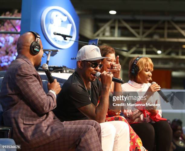 Bobby Brown and his wife Alicia Brown on stage with hosts Cayman Kelly and Michel Wright during SiriusXM's Heart & Soul Channel Broadcasts from...