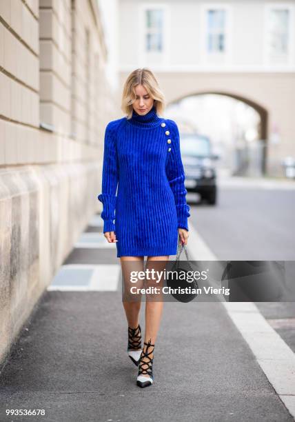 Lisa Hahnbueck wearing blue knit dress Balmain, round Balmain bag, Louis Vuitton high heels during the Berlin Fashion Week July 2018 on July 6, 2018...