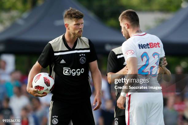 Klaas Jan Huntelaar of Ajax, Ovidiu Popescu of Steaua Bucharest during the Club Friendly match between Ajax v Steaua Bucharest at the Sportpark 't...