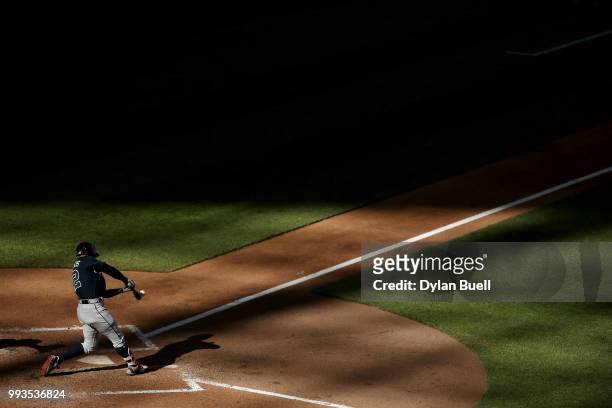 Nick Markakis of the Atlanta Braves hits a triple in the eighth inning against the Milwaukee Brewers at Miller Park on July 7, 2018 in Milwaukee,...