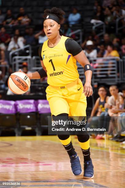 Odyssey Sims of the Los Angeles Sparks handles the ball against the Washington Mystics on July 7, 2018 at STAPLES Center in Los Angeles, California....