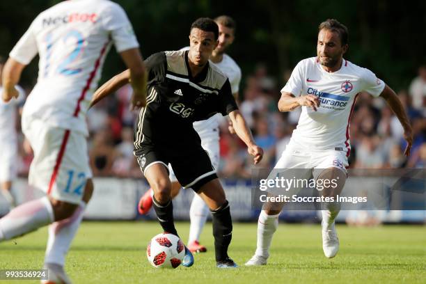 Noussair Mazraoui of Ajax, Filipe Teixeira of Steaua Bucharest during the Club Friendly match between Ajax v Steaua Bucharest at the Sportpark 't...