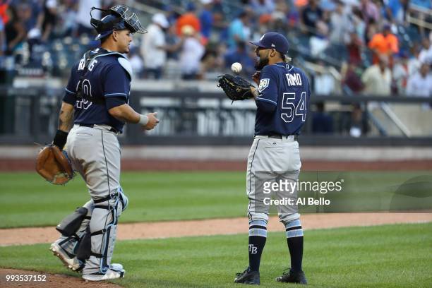 Wilson Ramos and Sergio Romo of the Tampa Bay Rays celebrate a 3-0 win against the New York Mets during their game at Citi Field on July 7, 2018 in...