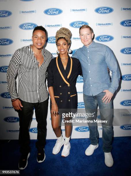 Rotimi Akinosho and Joseph Sikora from the cast of Power and Jade Novah pose for a photo during SiriusXM's Heart & Soul Channel Broadcasts from...