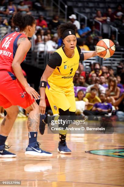 Odyssey Sims of the Los Angeles Sparks handles the ball against the Washington Mystics on July 7, 2018 at STAPLES Center in Los Angeles, California....