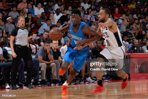 Daniel Hamilton of the Oklahoma City Thunder handles the ball against the Brooklyn Nets during the 2018 Las Vegas Summer League on July 7, 2018 at...