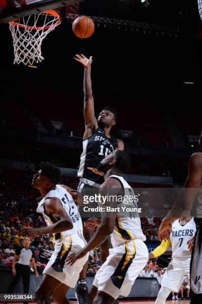 Chimezie Metu of the San Antonio Spurs handles the ball against the Indiana Pacers during the 2018 Las Vegas Summer League on July 7, 2018 at the...