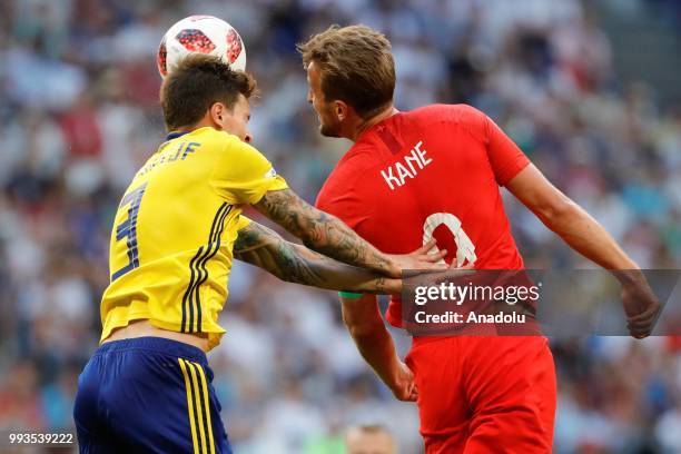 Victor Lindelof of Sweden in action against Harry Kane of England during the 2018 FIFA World Cup Russia quarter final match between Sweden and...