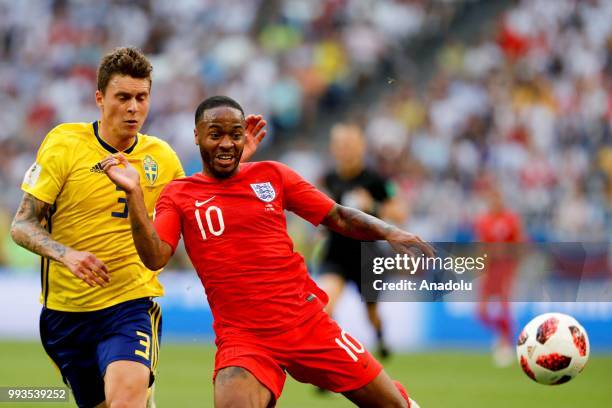 Victor Lindelof of Sweden in action against Raheem Sterling of England during the 2018 FIFA World Cup Russia quarter final match between Sweden and...