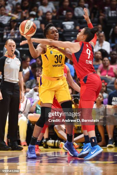 Nneka Ogwumike of the Los Angeles Sparks handles the ball against the Washington Mystics on July 7, 2018 at STAPLES Center in Los Angeles,...