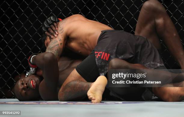 Max Griffin controls the body of Curtis Millender in their welterweight fight during the UFC 226 event inside T-Mobile Arena on July 7, 2018 in Las...