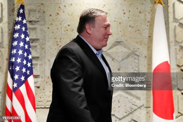 Mike Pompeo, U.S. Secretary of state, arrives to greet Taro Kono, Japan's foreign minister, not pictured, ahead of their breakfast meeting in Tokyo,...