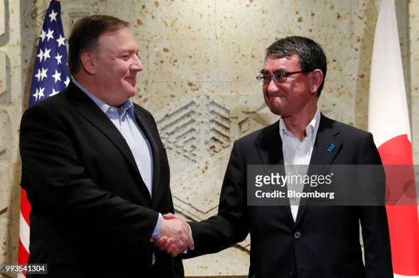 Mike Pompeo, U.S. Secretary of state, left, shakes hands with Taro Kono, Japan's foreign minister, ahead of their breakfast meeting in Tokyo, Japan,...