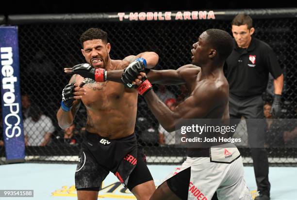 Curtis Millender punches Max Griffin in their welterweight fight during the UFC 226 event inside T-Mobile Arena on July 7, 2018 in Las Vegas, Nevada.