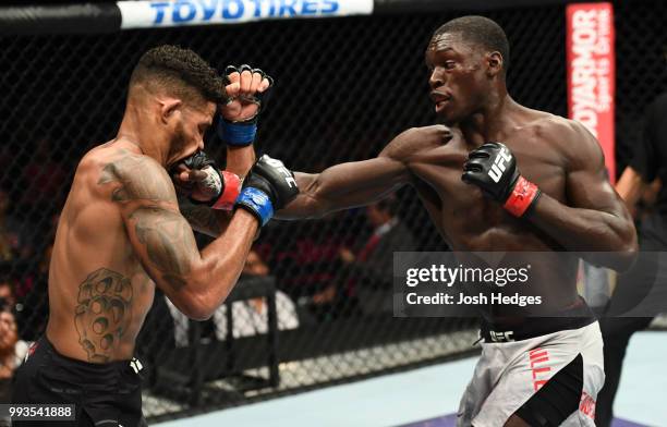 Curtis Millender punches Max Griffin in their welterweight fight during the UFC 226 event inside T-Mobile Arena on July 7, 2018 in Las Vegas, Nevada.