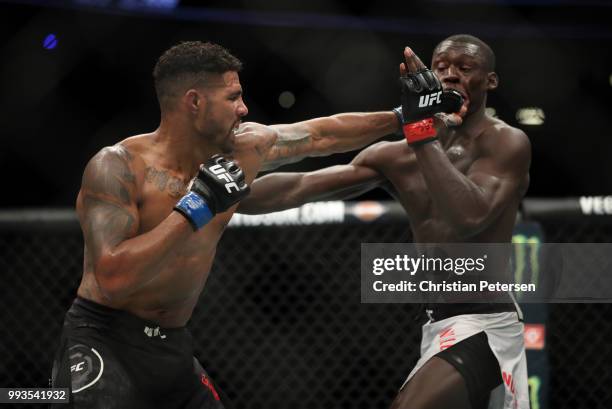 Max Griffin punches Curtis Millender in their welterweight fight during the UFC 226 event inside T-Mobile Arena on July 7, 2018 in Las Vegas, Nevada.