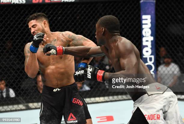 Curtis Millender punches Max Griffin in their welterweight fight during the UFC 226 event inside T-Mobile Arena on July 7, 2018 in Las Vegas, Nevada.