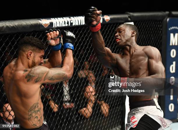 Curtis Millender punches Max Griffin in their welterweight fight during the UFC 226 event inside T-Mobile Arena on July 7, 2018 in Las Vegas, Nevada.