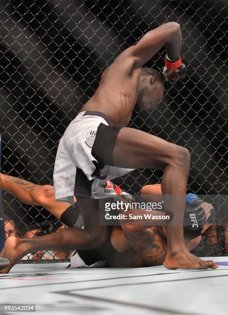 Curtis Millender punches Max Griffin during their welterweight fight at T-Mobile Arena on July 7, 2018 in Las Vegas, Nevada.