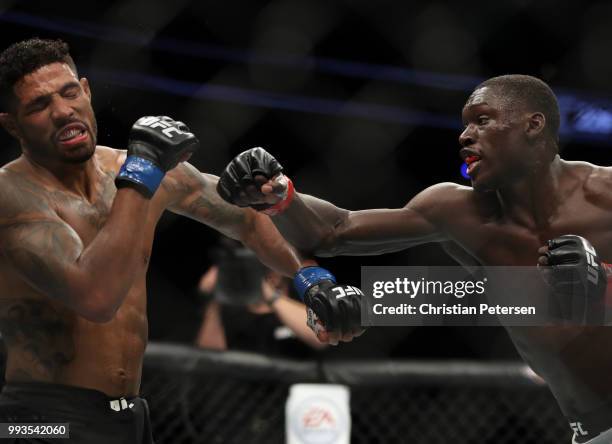 Curtis Millender punches Max Griffin in their welterweight fight during the UFC 226 event inside T-Mobile Arena on July 7, 2018 in Las Vegas, Nevada.