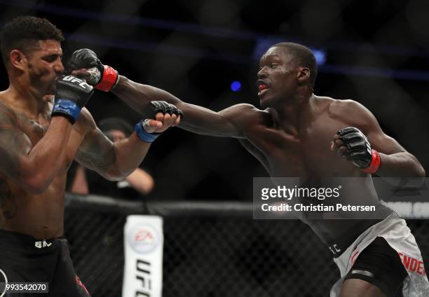 Curtis Millender punches Max Griffin in their welterweight fight during the UFC 226 event inside T-Mobile Arena on July 7, 2018 in Las Vegas, Nevada.